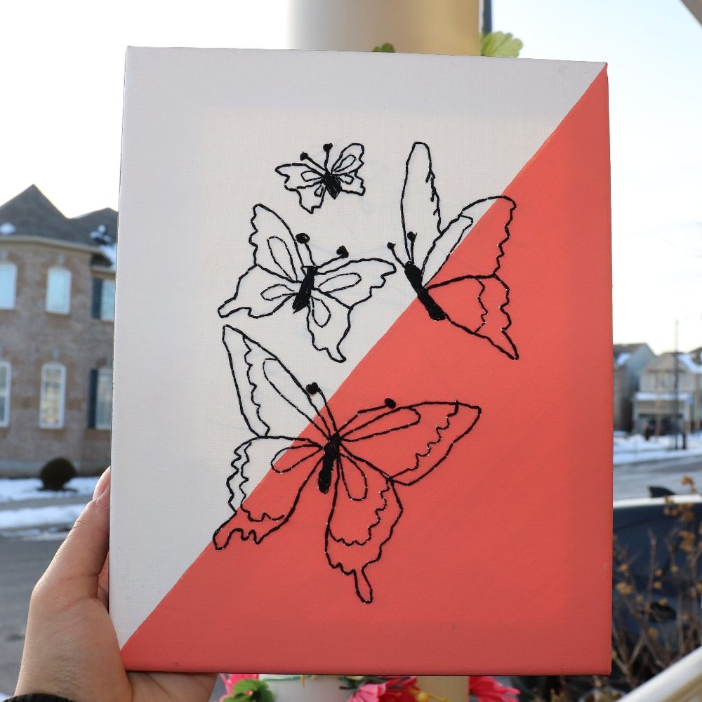 Handmade Embroidery Canvas with butterfly design.